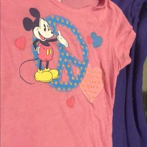 a pink mickey disney shirt